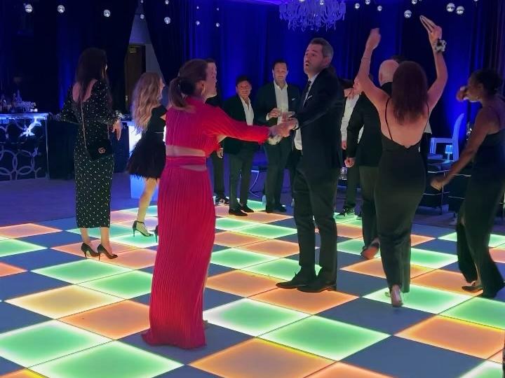 Modern light up disco floor creating magical atmosphere at wedding