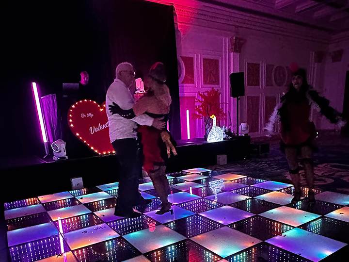 Wedding dance floor with dancing guests